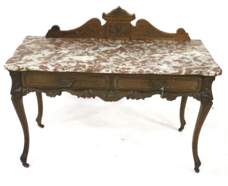 A 20th century serpentine marble top console table. Consisting of two drawers, swing handles and carved cabriole legs on cast