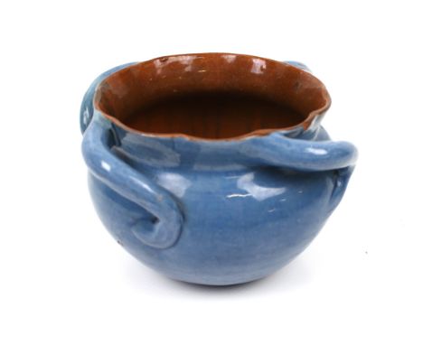A Victorian British art pottery C H Brannam blue glazed bowl. With three curved handles. Back stamp to base. H9.5cm