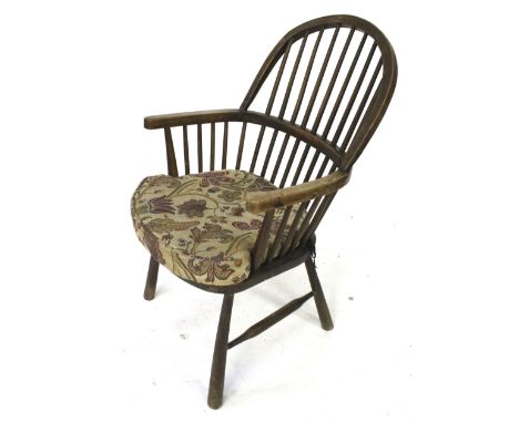 A 19th century Windsor stick back armchair with ash hoop, elm seat etc.. H103cm