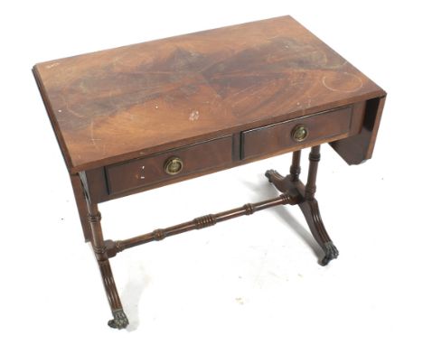 A mahogany Regency style occasional table. Of small sofa table form with frieze drawers. L65cm x D40cm X H52cm