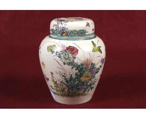  A circa 1900 Chinese baluster shaped caddy and cover. Containing an internal lid, having polychrome enamel decoration, signe