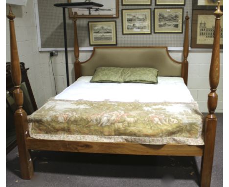 A contemporary four poster super king bed (6 ft wide) and mattress. With turned pedestal shaped hardwood posts and padded sha