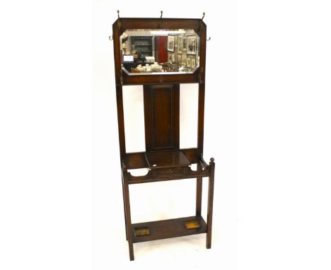 An early 20th century oak hall umbrella coat stand. With a mirror attached to the upper section, L69cm x D33cm x H183cm
