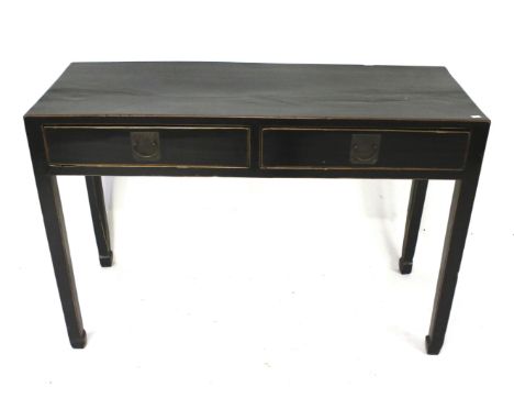 A Chinese style black lacquered two drawer console table. With brass handles, squared legs terminating in shaped feet, H89cm 