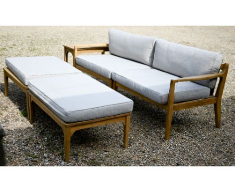 Cox &amp; Cox, an all weather outdoor seating set comprising a two part sofa, pair of low tables, all with cushions and to/wi