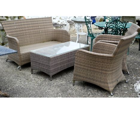 Dobbies, a simulated rattan all-weather garden set comprising a sofa, a pair of matching armchairs with cushions, and a match