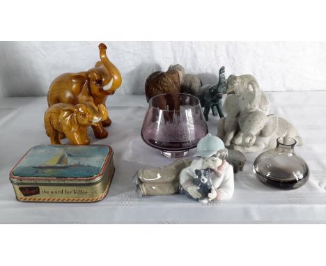 A selection of collectables to include Nao girl with dog, Elephant figures & 2 Pieces of Caithness.