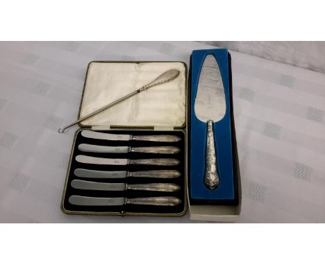 A set of 6 silver handled knives, silver handled cake knife & button hook 
