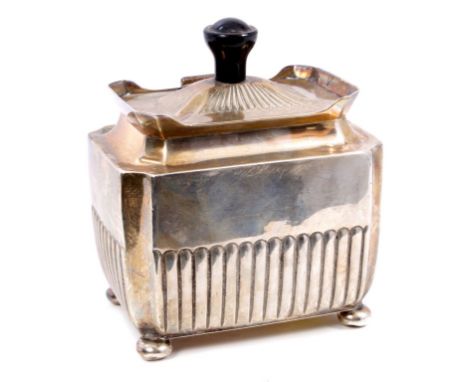 Victorian silver tea caddy of rectangular form, with concave corners and half fluted decoration, hinged domed and fluted cove