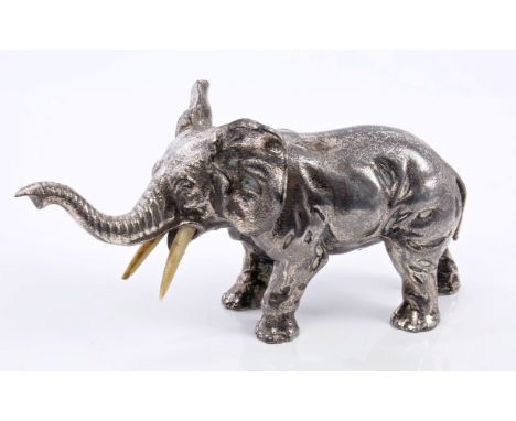 Late 19th / early 20th century silver plated model of an elephant with raised trunk, underside of front right foot stamped - 
