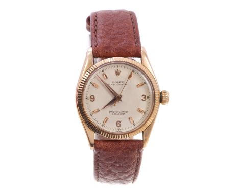 1950s Rolex Oyster Perpetual gold (18ct) mid-size wristwatch with twenty-six jewel automatic 1130 calibre movement, numbered 