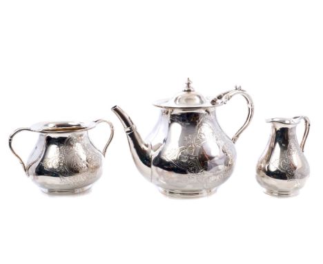 Victorian silver three piece tea set, comprising teapot of baluster form, with engraved Gothic-style decoration, silver split