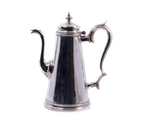 Rare George II provincial silver coffee pot of tapering cylindrical form, with dot-punched borders, engraved crest, serpent-s