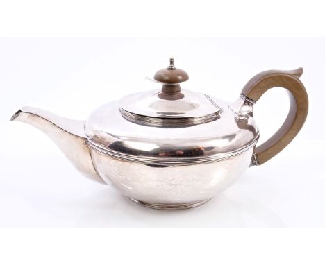 Contemporary silver teapot of compressed form, with scroll handle and hinged domed cover, with turned finial on circular base
