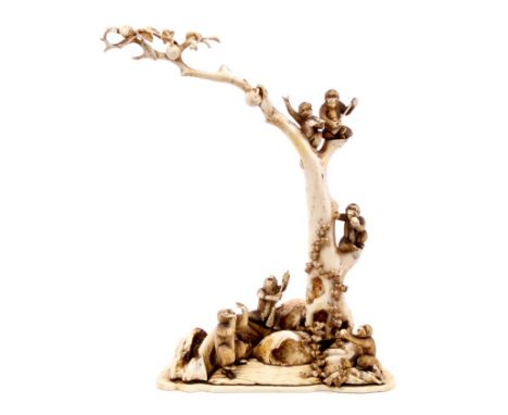 Late 19th century Japanese carved ivory figure group of monkeys in and around a tree, playing instruments, reading, sweeping 