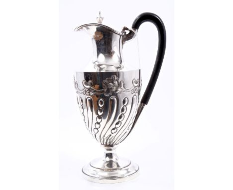 Late Victorian silver hot water jug of classical baluster form, with wrythen chain and fluted decoration and band of scroll a