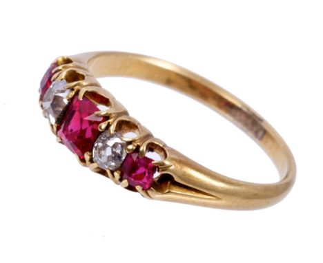 Victorian ruby and diamond five stone ring with three mixed cut rubies and two old cut diamonds in gold claw setting.  Ring s