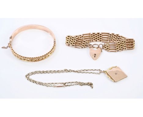 Early 20th century rose coloured metal gate bracelet, early 20th century rose gold (9ct) hinged bangle (Birmingham 1912) and 