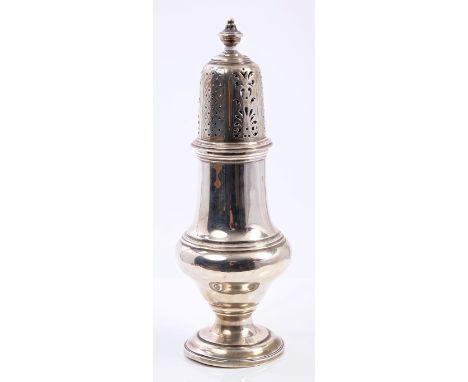 Victorian silver sugar caster of baluster form, with engraved crest, detachable pierced cover and urn finial, on a circular p