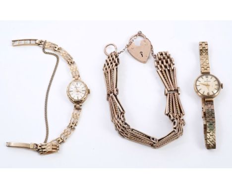 Edwardian yellow metal gate bracelet and two ladies' gold (9ct) wristwatches on gold bracelet