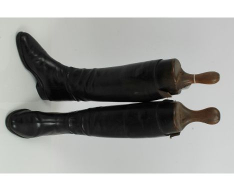 Pair of ladies' black leather hunting boots with wooden trees