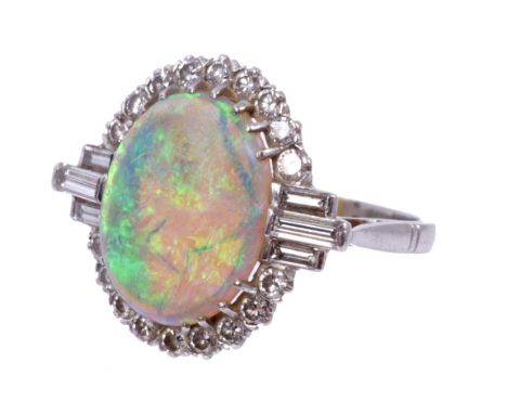 Art Deco-style opal and diamond cocktail ring, the large oval cabochon opal surrounded by eighteen brilliant cut diamonds wit