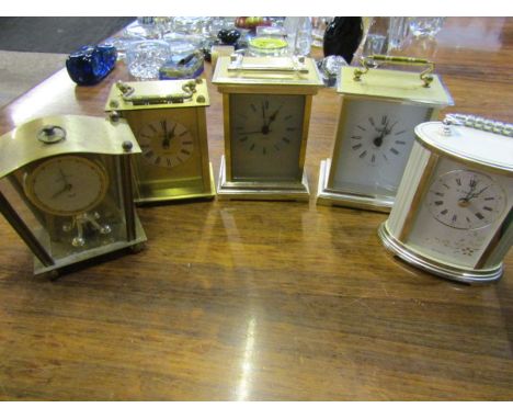 Anniversary clock and 4 battery carriage clocks