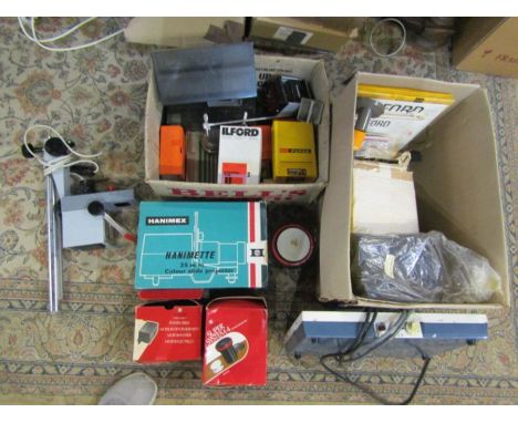 Hanimex projector and 2 boxes of relatable accessories