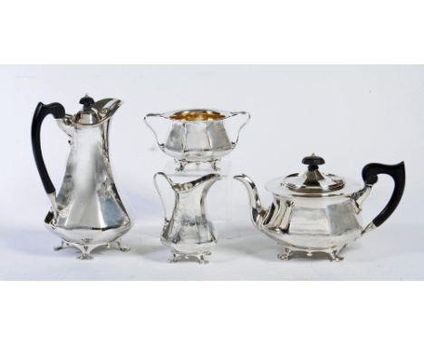 AN ART NOUEAU STYLE FOUR PIECE SILVER TEA AND COFFEE SERVICE, maker Charles Clement Pilling, Sheffield 1923 (coffee pot Manoa