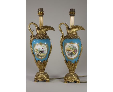 A PAIR OF SEVRES STYLE PORCELAIN GARNITURE EWERS, late 19th century, of rounded conical form, painted in polychrome enamels w