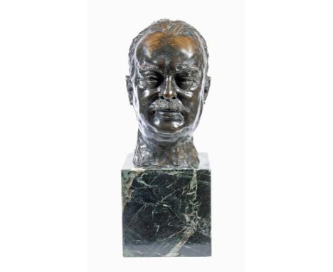 FELIX WEISS (Austrian 1908-2003), Portrait Bust of a Gentleman, signed and dated 1935, raised on green marble plinth, dark br