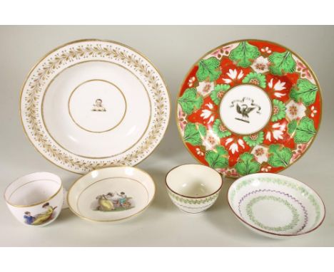TWO ENGLISH PORCELAIN ARMORIAL SOUP PLATES, c.1820, one with monochrome swan in chains below the motto "Fides in Amicitia" wi