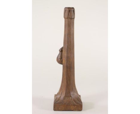 AN OAK TABLE LAMP BASE BY ROBERT THOMPSON, of swept square section with stiff leaf angles, carved mouse trademark in high rel