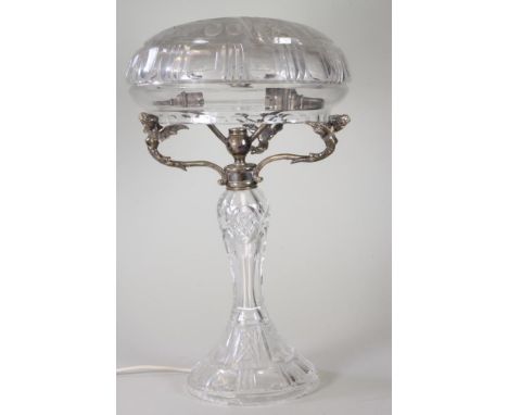 A TABLE LAMP BASE, early 20th century, the slice and flower cut mushroom shade supported on three EPNS scroll branches with w