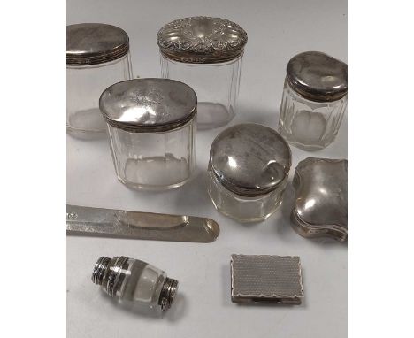 A silver paper knife, mark of Sampson Mordan, together with some silver topped glass cosmetics jars, a silver trinket box, sn