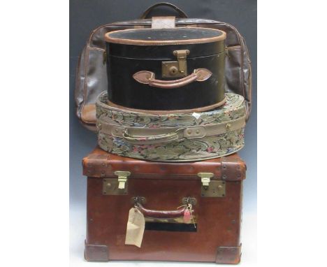 A large square leather suitcase by H J Cave and Sons "Osilite", monogrammed MC No 3, a black and tan leather bound hat box, a