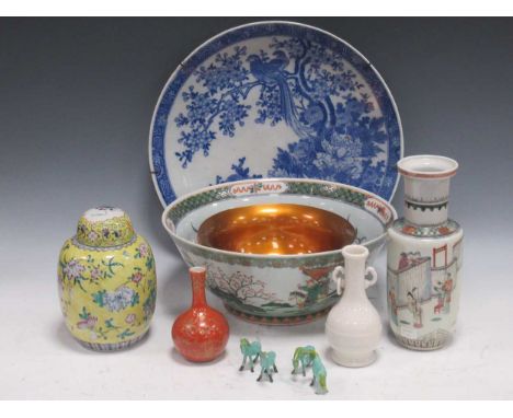 Asian ceramics to include a Chinese rouleau vase (restored), a 20th century punch bowl, yellow ground jar and cover (early 20