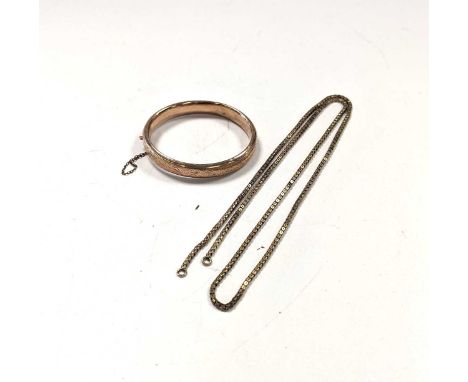 A chain tested as 9ct gold, together with a bangle tested as 9ct gold, gross weight 26g (2)