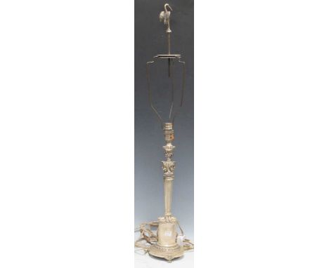 Possibly French, a cast metal table lamp in the neoclassical taste,with heron finial over on paw feet86cm high