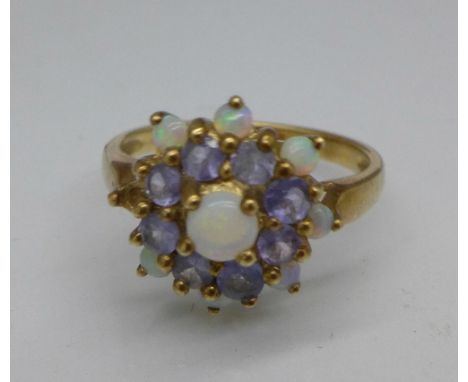 A 9ct gold, opal and tanzanite ring, 3g, K