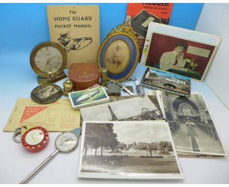 Assorted postcards, map reader, gilt metal photograph frame, Cyma Amic table clock