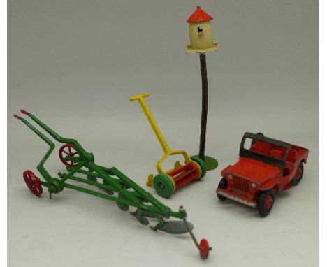 A Dinky Toys Meccano Jeep and push mower, a Britains Farm Plough and dovecote, (4)