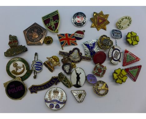 A collection of thirty enamel and other badges