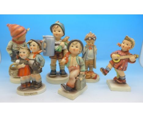 Six Hummel figures including For Father, March Winds, Merry Wanderer, Surprise, etc.