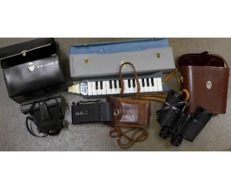 A Hohner Melodica piano 26, a Polaroid camera, a folding camera and a pair of Carl Zeiss Jena Jenoptem 7x50 binoculars, cased