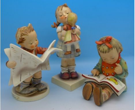 Three Hummel figures, including Latest News, very small paint loss to red ribbon