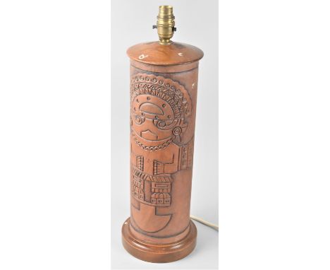 A Cylindrical Tooled Leather Covered Table Lamp Base with Aztec Decoration, 48cms High 