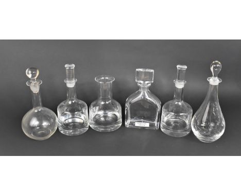 A Collection of Various Glass Decanters to include Orrefors Example 