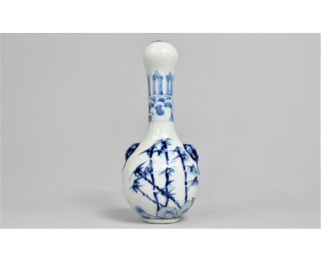 An Oriental Blue and White Bottle Vase with Garlic Head Top Decorated with Bamboo to Body and Having Twin Lion Ring Mask Hand