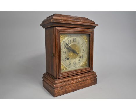 An Edwardian Oak American Mantel Clock Case with Replacement Electric Movement, 32cms High 